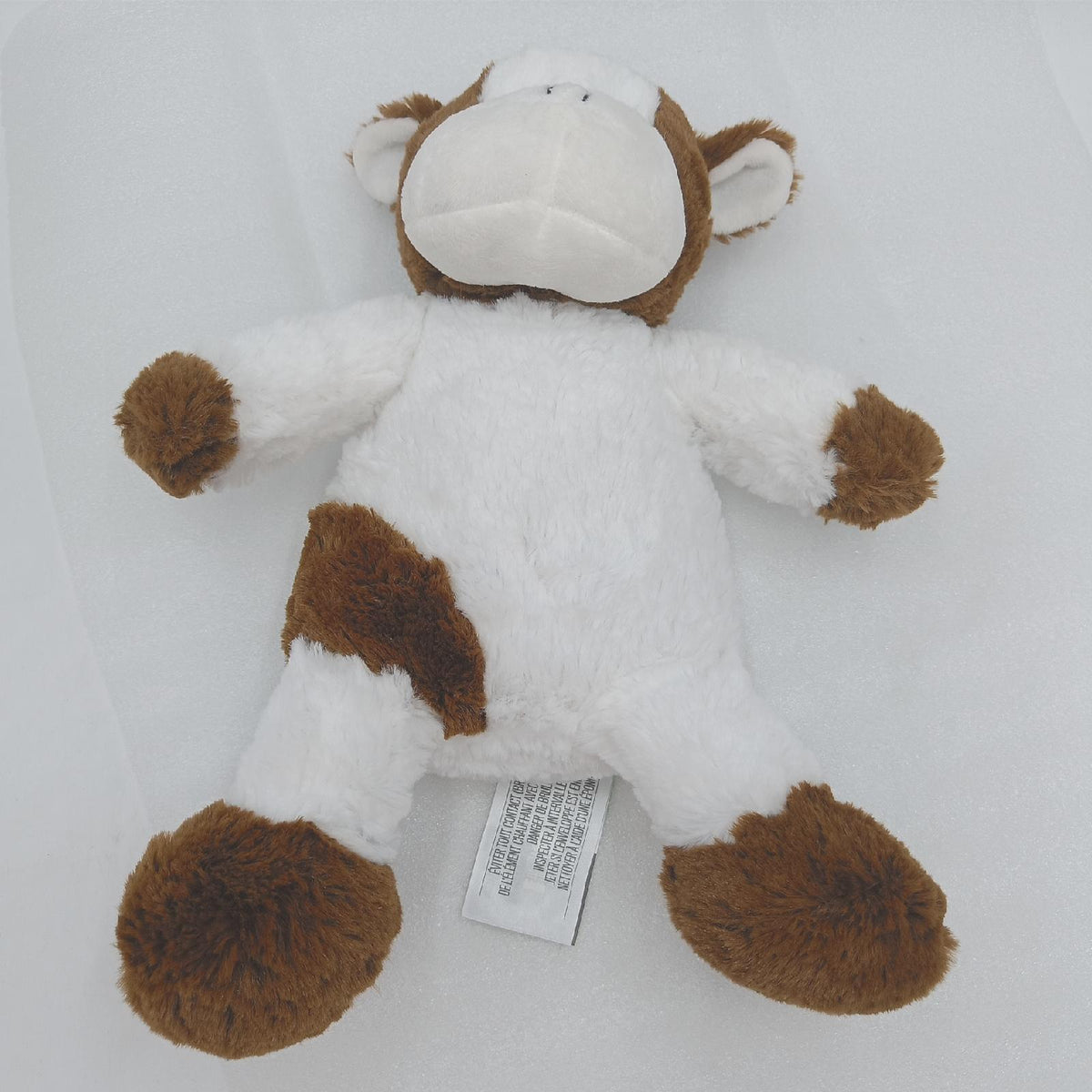 PELUCHO Flauscho Kuh mit Wärmekissen PELV Weiß Braun