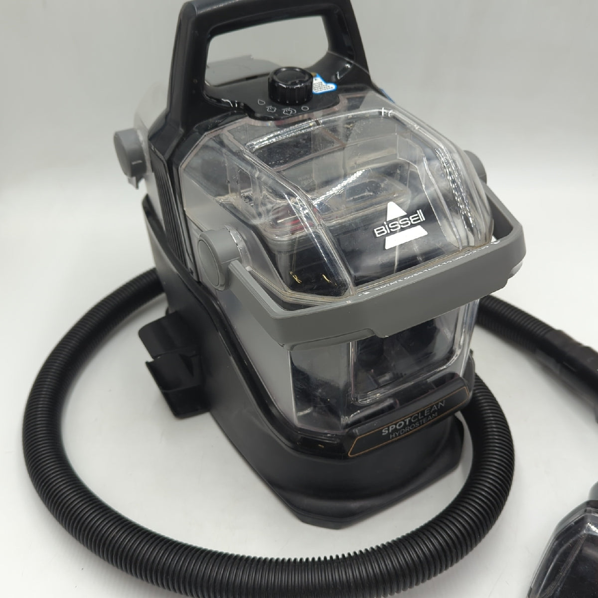 Bissell HydroSteam Fleckenreiniger SpotClean mit sichtbaren Gebrauchsspuren und Verschmutzungen