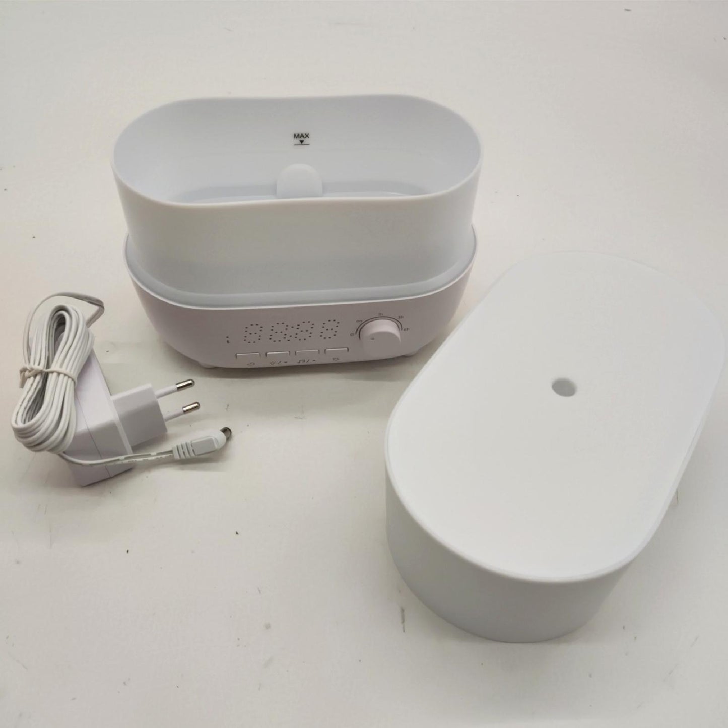 Hubble Connected Mist 5-in-1 Smart-Luftbefeuchter für Babys mit Aroma-Diffusor, Bluetooth-Lautsprecher, 7-farbiger Nachtlichtfunktion, LED-Digitaluhr, 10 Stunden Batterielaufzeit und Smartphone-App