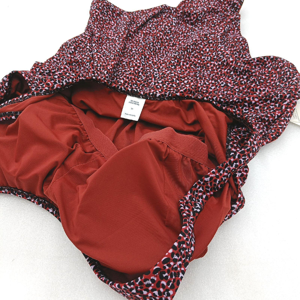 Amazon Essentials Damen Einteiliger bedeckender Badeanzug mit Rundhalsausschnitt in Übergröße erhältlich  Ziegelrot Leopardenmuster  3XL Große Größen