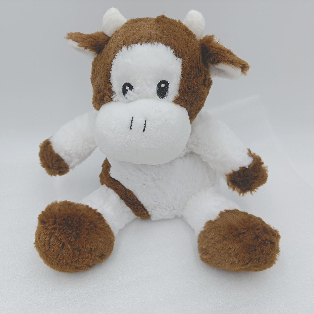 PELUCHO Flauscho Kuh mit Wärmekissen  PELV  Weiß  Braun