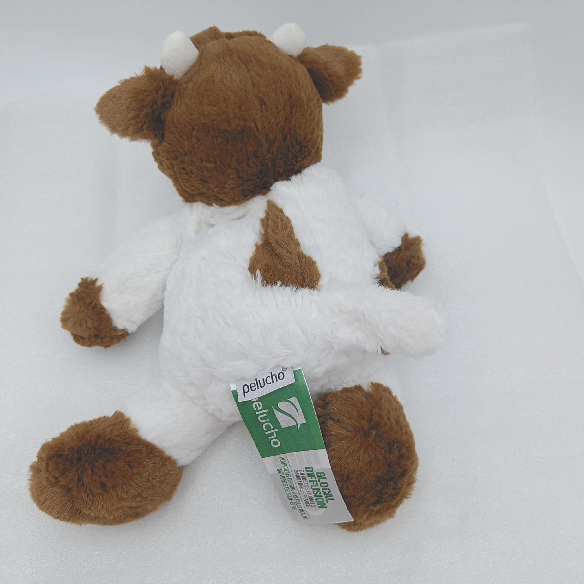 PELUCHO Flauscho Kuh mit Wärmekissen  PELV  Weiß  Braun