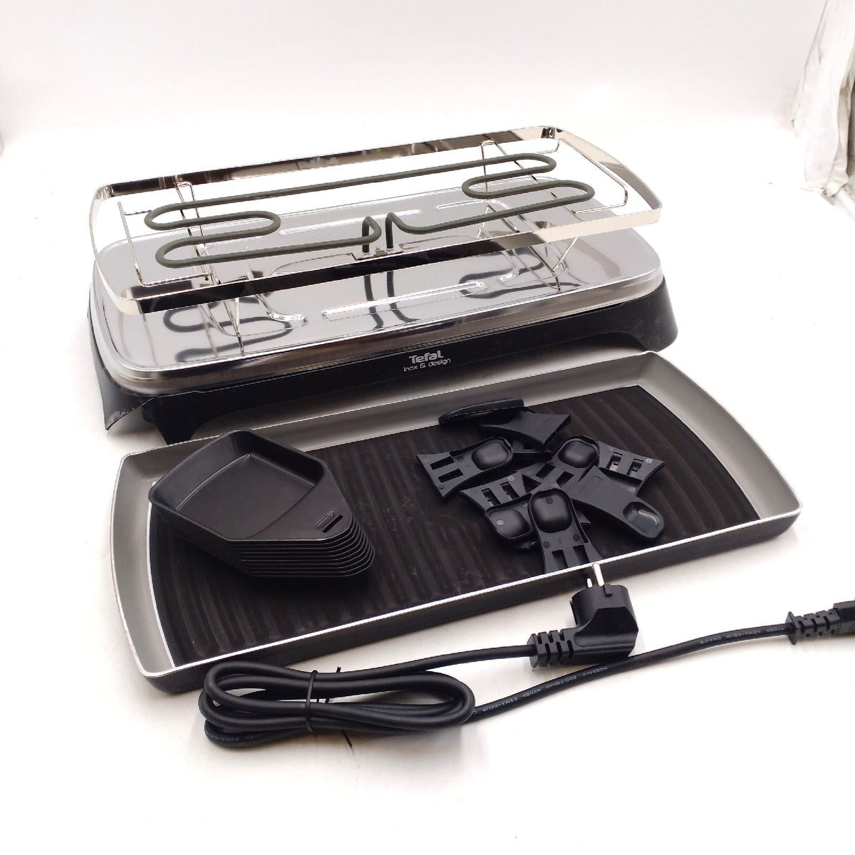 Tefal Raclette Grill Ambiance  Raclette 10 Personen  inkl. Tischgrill-Funktion  Grillplatte antihaftbeschichtet + spülmaschinengeeignet  abnehmbares 2 Meter-Kabel  schwarz  Edelstahl  1350W  RE4588